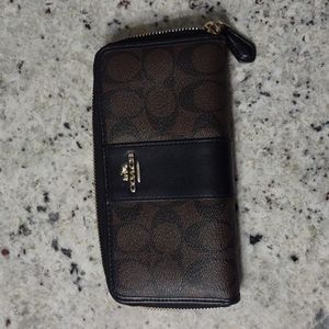 Black and brown Coach wallet